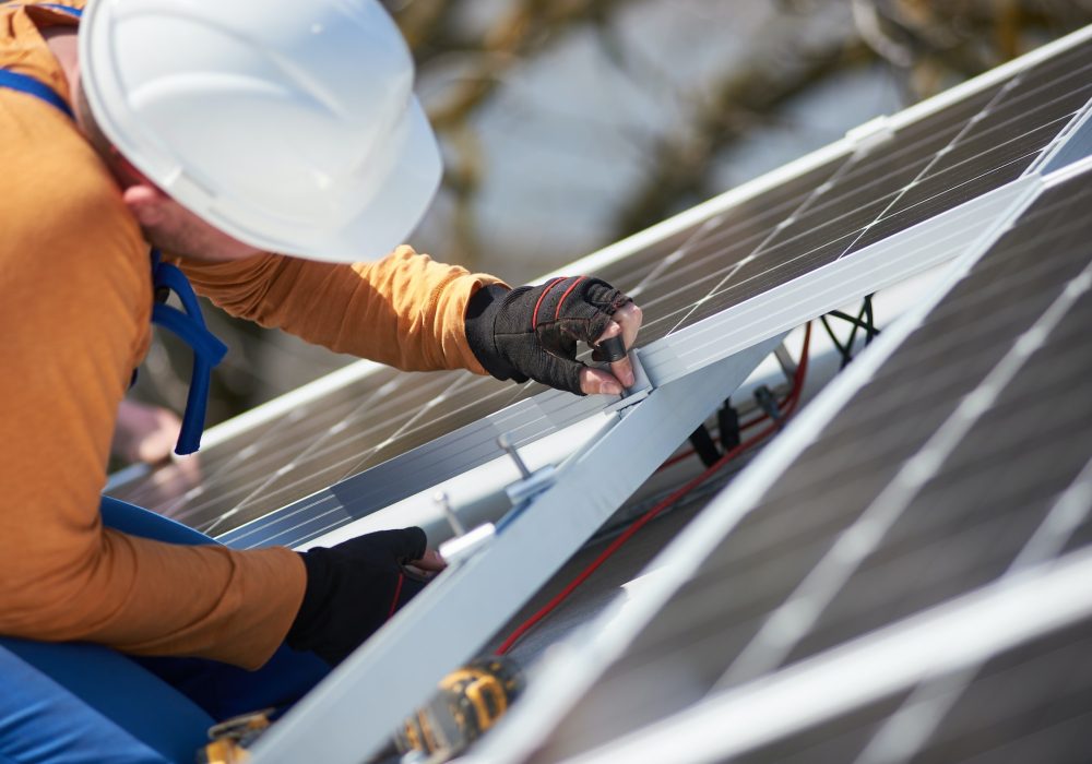 Installing solar photovoltaic panel system on roof of house